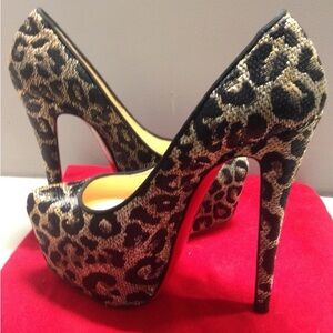 Christian Louboutin 
Lame Leopard Print Fabric 
Gold/Blk Pumps